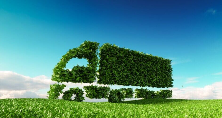 Eco friendly transportation concept. 3d rendering of green green truck icon on fresh spring meadow with blue sky in background.